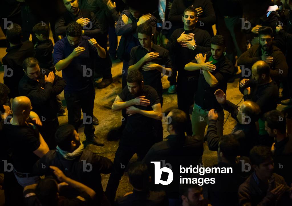 Iranian Shiite Muslim Men Chanting and Self-flagellating during Ashura, Golestan Province, Gorgan, Iran (photo)