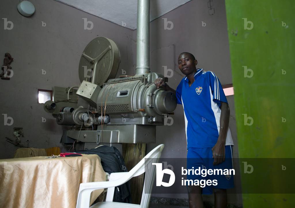 Projectionist at the Impala Cinema Theater, Namibe Town, Angola, Africa (photo)