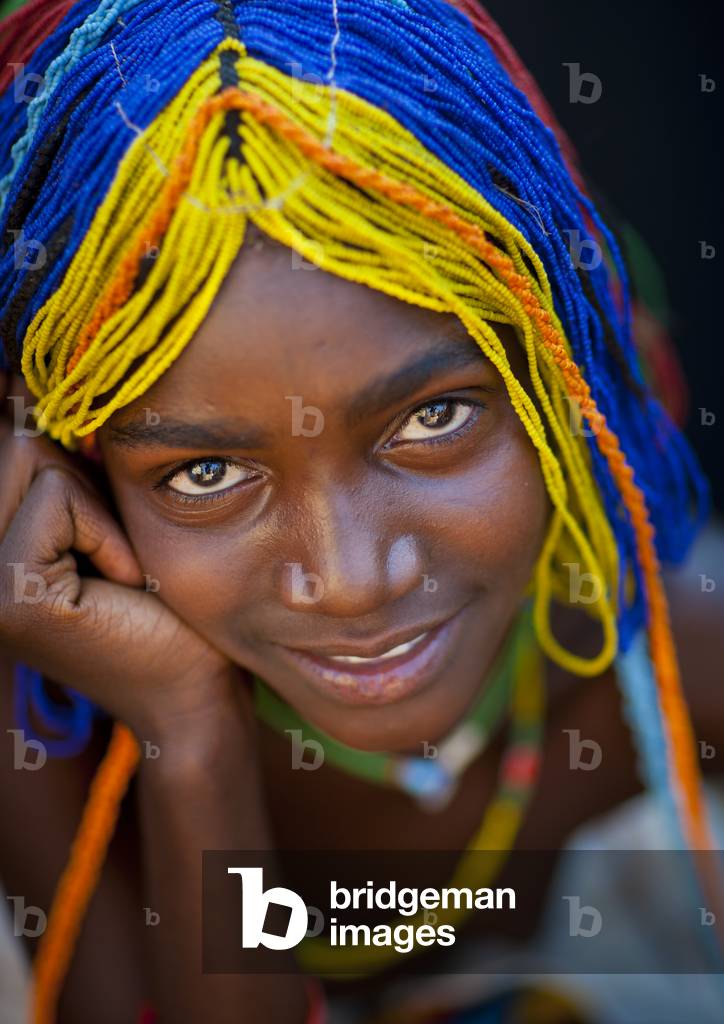 Mudimba Girl with a Beaded Wig called Misses Ena, Village of Combelo, Angola, Africa (photo)