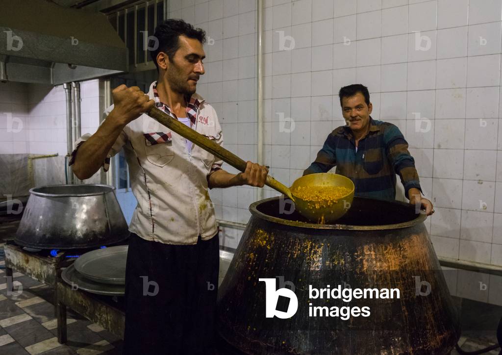 Iranian Shiite Muslim Cookers Preparing Nazri Charity Food during Muharram before Ashura Celebrations, Isfahan Province, Kashan, Iran (photo)
