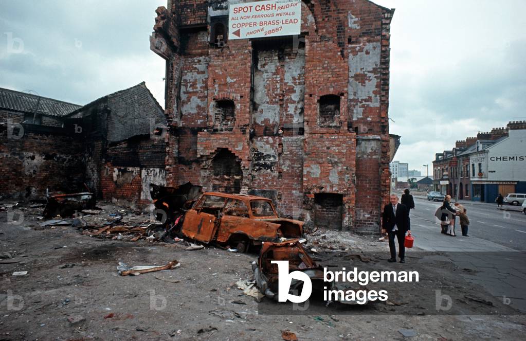 Burntout hijacked vehicles in Belfast during The Troubles, Northern Ireland, 1972