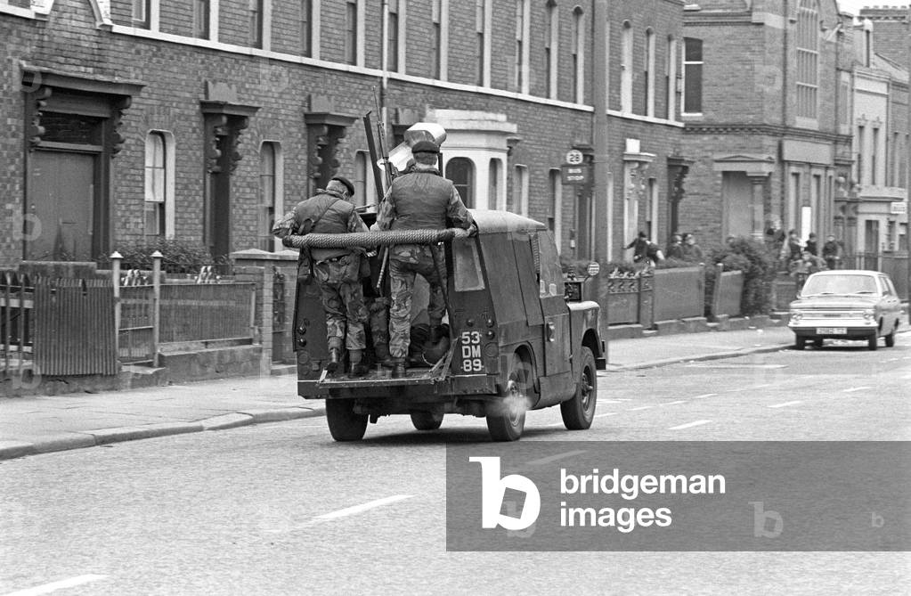 British Army on patrol in Belfast early 70s during The Troubles, Northern Ireland, 1972 (b/w photo)