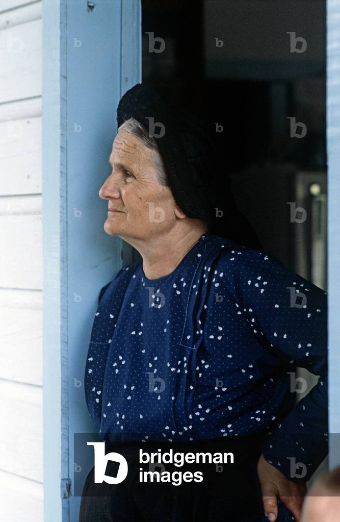 Mennonite mother in Spanish Lookout settlement farm, Belize, Central America, June 1985 (photo)