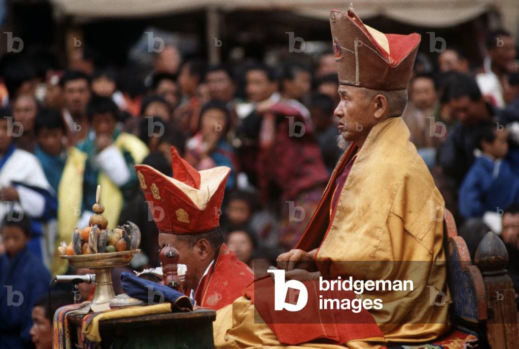 Buddhist Abbot monk at the Paro Tshechu, mask dance festival, in the Paro Dzong, Bhutan (photo)