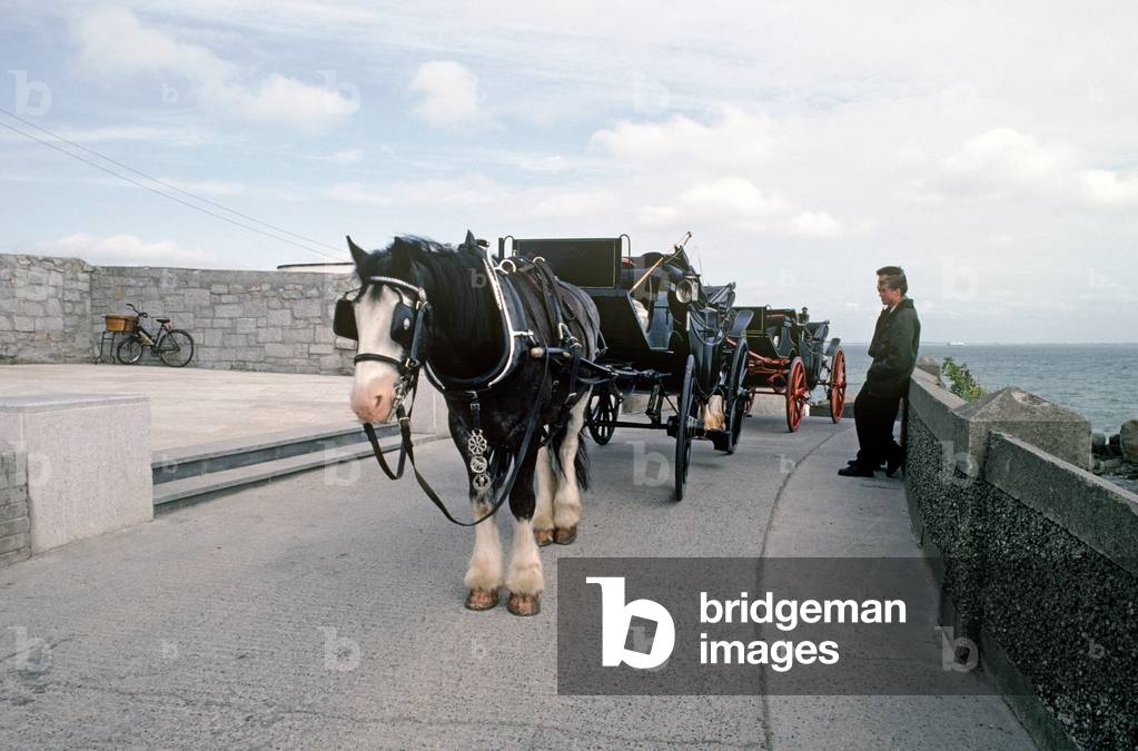 Bloomsday commemoration with actors outside James Joyce Martello Tower and museum of the events in the novel Ulysses on the 16th June 1904, Sandycove, Dublin, Ireland (photo)