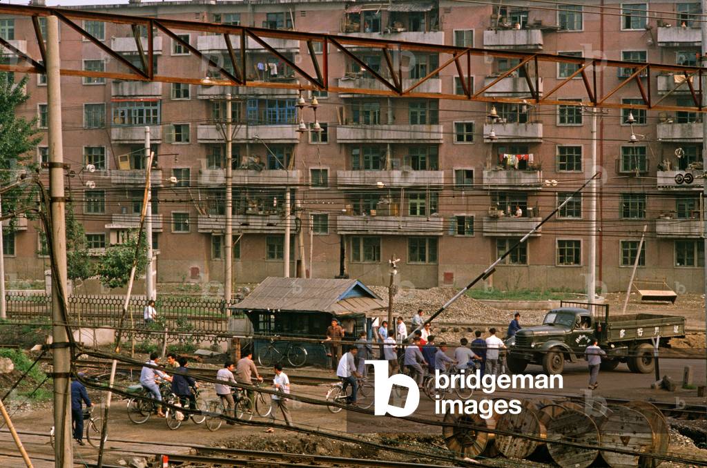 Coal miners apartments next to railway, Fushun mining town, Liaoning Province, China (photo)