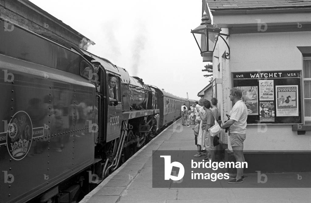 Passengers at Watchet station on the West Somerset Heritage Railway, Somerset, England, UK, 1990 (b/w photo)