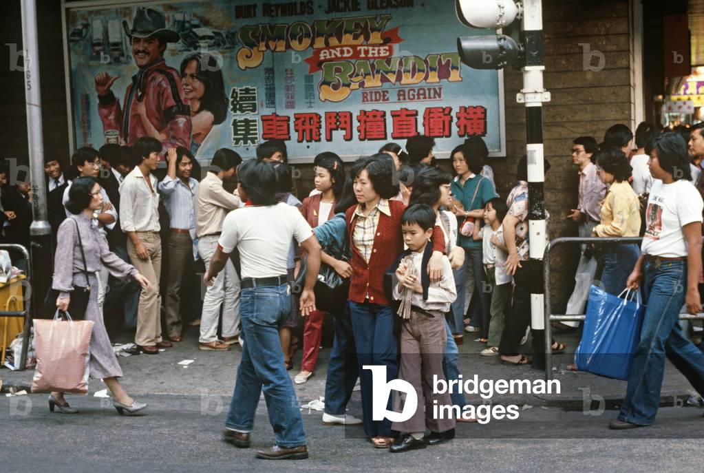Cinema poster and queue, Hong Kong, 1980s