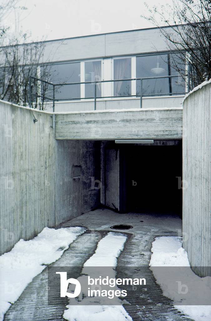 Concrete ramps to entrance to a suburban commune underground nuclear fall-out shelter, Switzerland (photo)