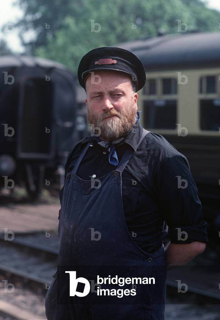 Engine driver at Bewdley station on the Severn Valley Heritage Railway, Shropshire & Worcester, England, UK, 1989 (photo)