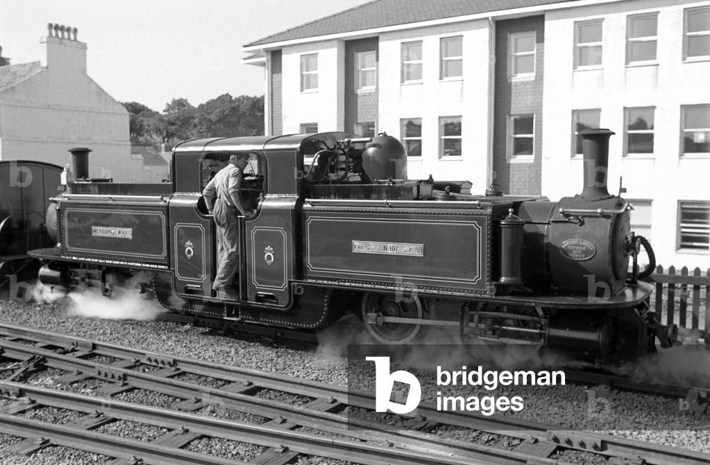 Steam locomotive at Porthmadog railway station, Gwynedd, North Wales, 1990 (photo)