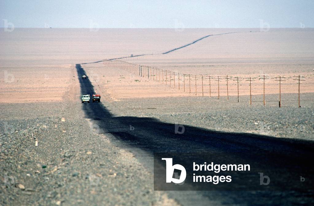 Silk Road running through Turpan Desert, Xinjiang Province, China, 1985 (photo)