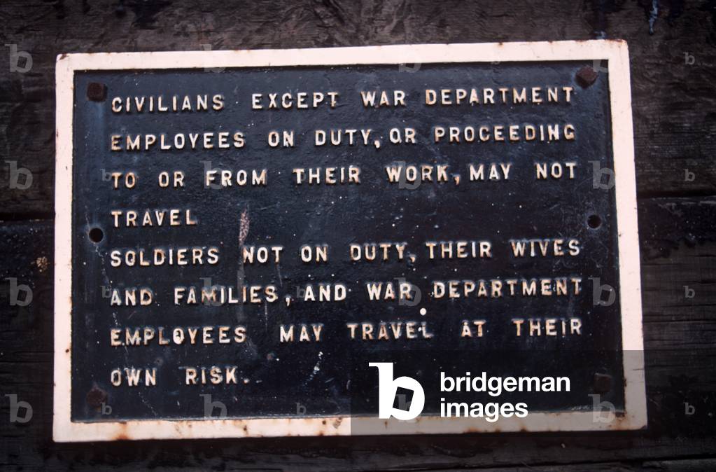 War Department notice at Williton Station on the West Somerset Heritage Railway, Somerset, England, UK, 1990 (photo)
