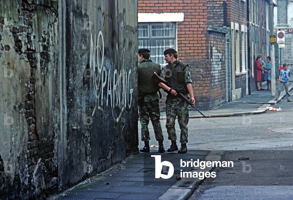 British army soldiers patrolling streets of Nationalist West Belfast during The Troubles, Northern Ireland, 1973
