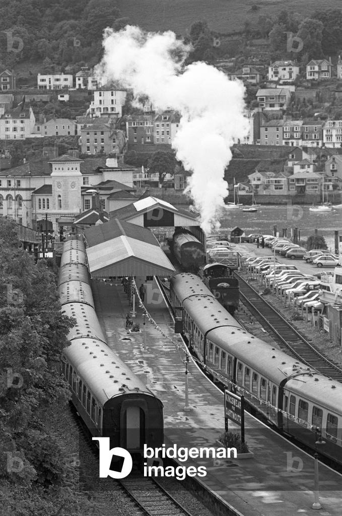 Steam trains pulling out of Kingswear and Dartmouth station on the Heritage Dartmouth Steam Railway, Devon, England, UK, 1989 (photo)