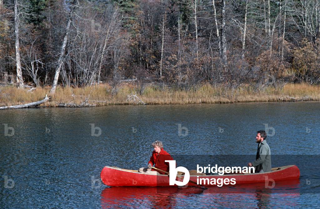 Indian canoe on Dawson City lake, Yukon Territories, Canada (photo)
