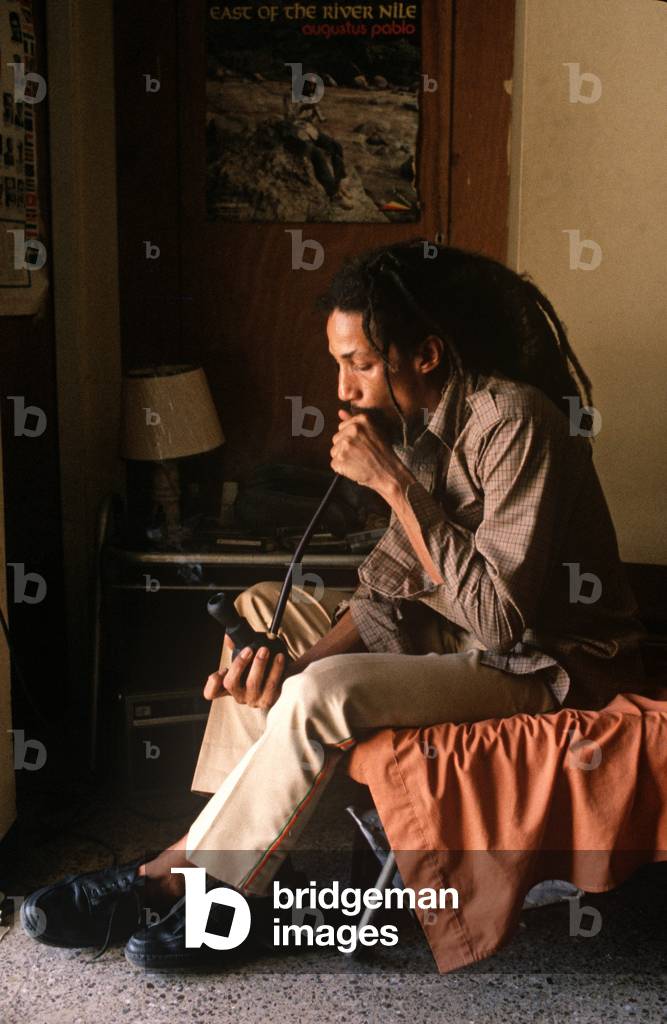 Augustus Pablo smoking, Kingston.Jamaica (photo)