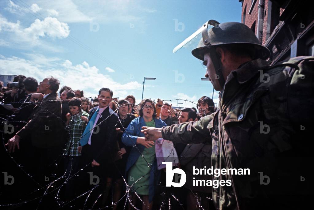 British Army holding back Hunger Strikers demonstrating in West Belfast during The Troubles, Northern Ireland, 1981 (photo)
