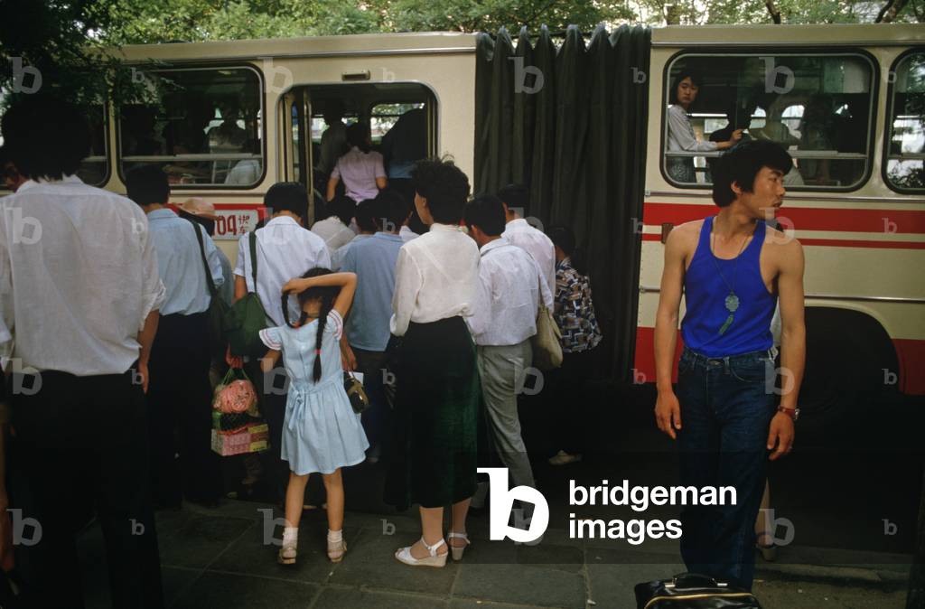 Beijing bus passengers, China (photo)