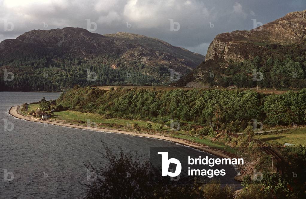 Kyle of Lochalsh Line running alongside Loch Carron, North West Coast of Scotland, 1982 (photograph)