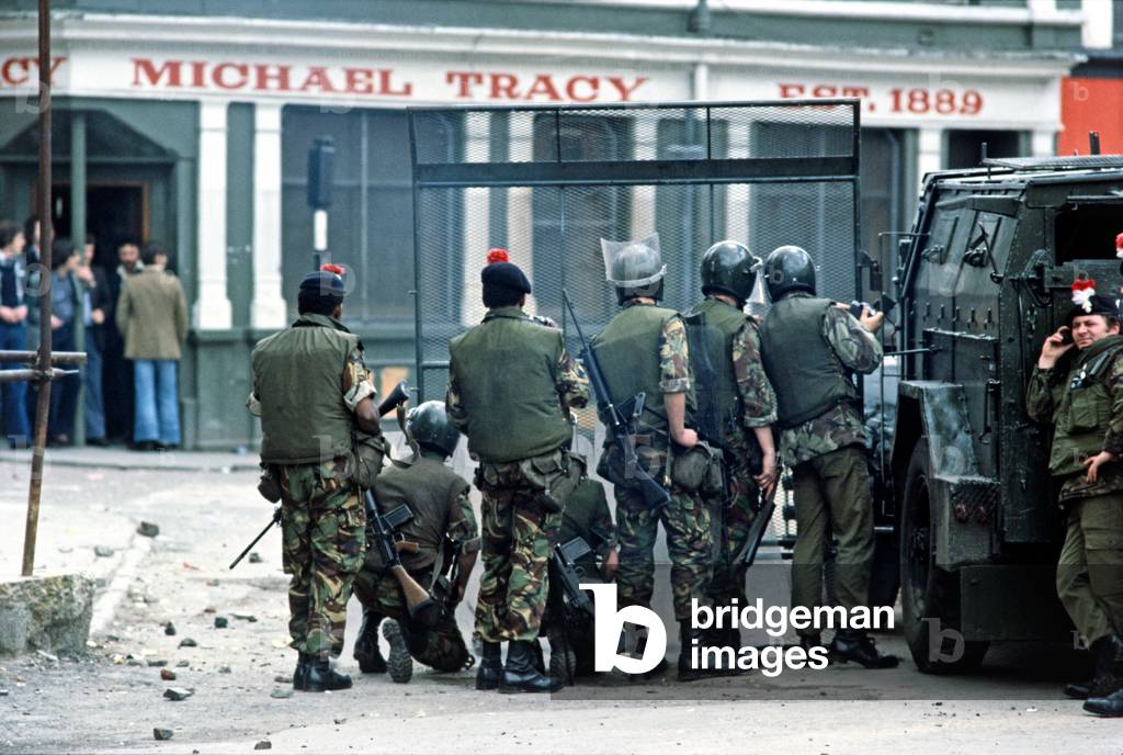 British Army controlling Rioting in the Streets of Derry after Apprentice Boys March during The Troubles, Londonderry, Northern Ireland, 1975 (photo)