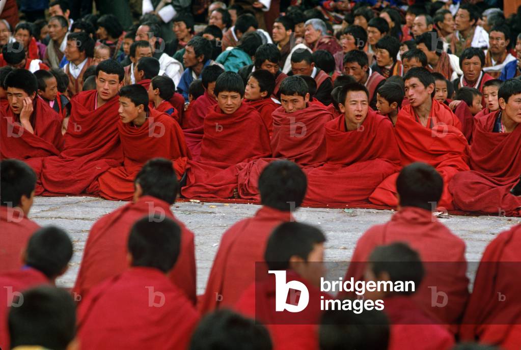 Buddhist monks at the Paro Tshechu, mask dance festival, in the Paro Dzong, Bhutan (photo)