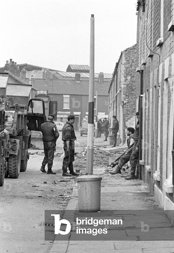 British Army on patrol in Belfast, Northern Ireland early 70s during The Troubles, 1972 (b/w photo)