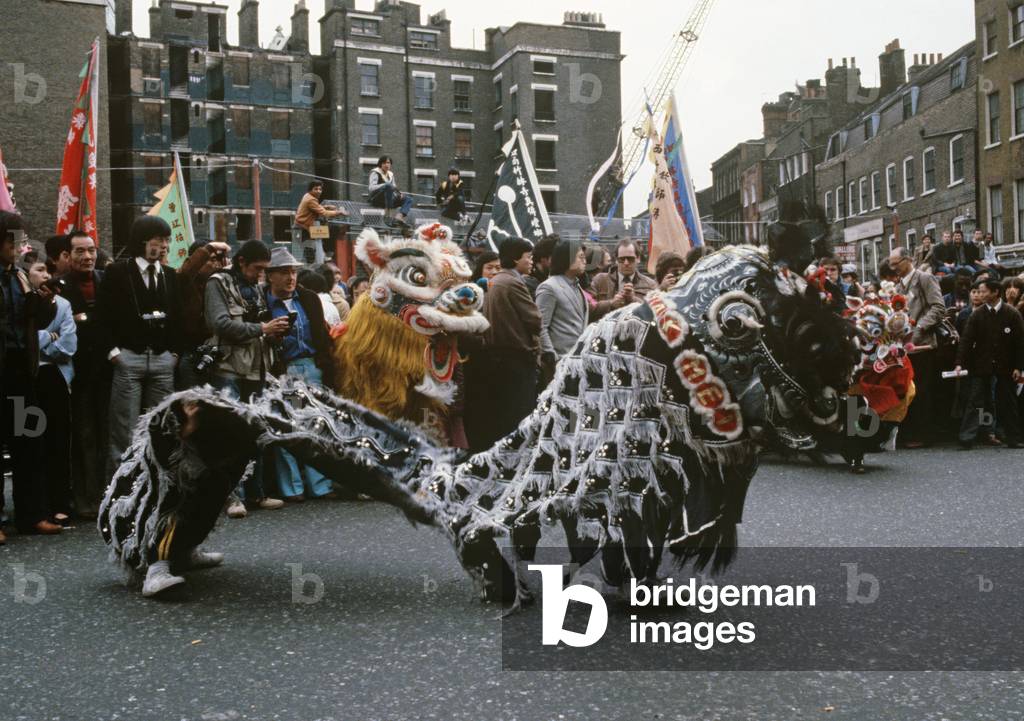 Chinese New Year festivities with dragons in Chinatown, Soho, London, UK, 1981 (photo)