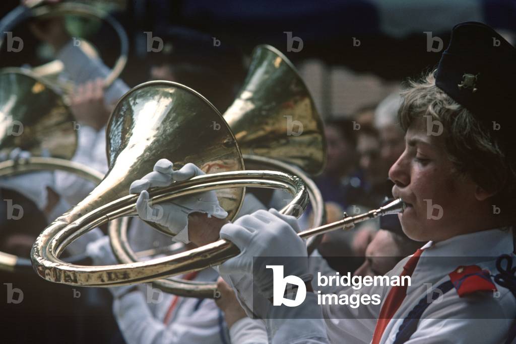 Horn player in Grimaud Village band, Cote D'Azur, France (photo)