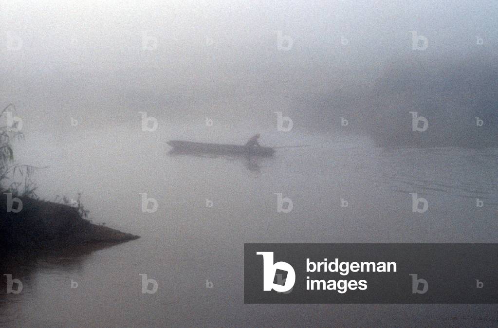 Fisherman in early morning mist, Madagascar, East Africa, Africa, 1980s (photo)