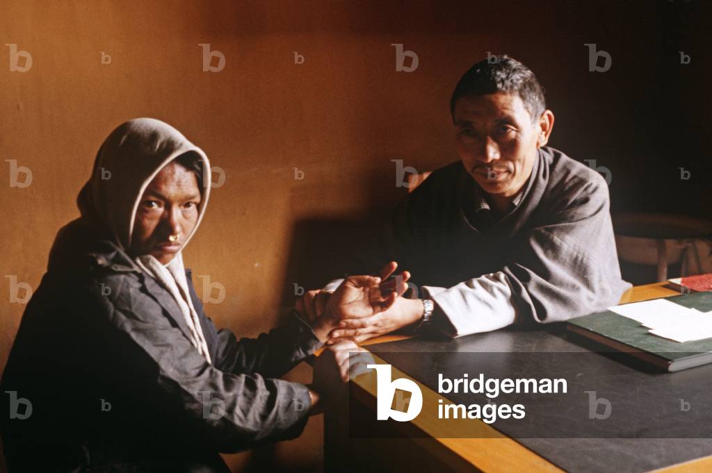 Bhutanese traditional doctor with patient , Thimphu medical centre, Thimphu, Bhutan, Himalayas (photo)
