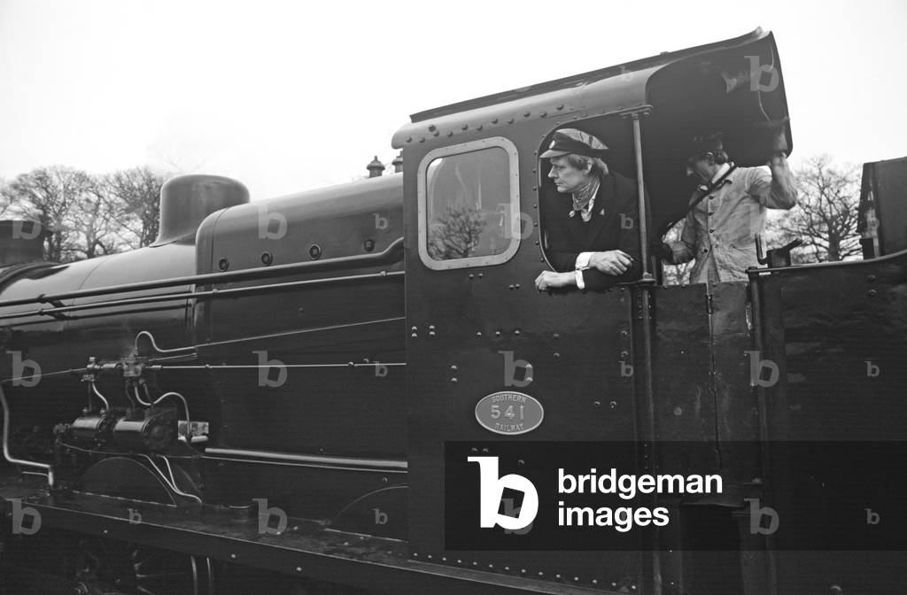 Steam locomotive driver on the  Bluebell Heritage Railway, West Sussex, England, UK, 1990 (photo)