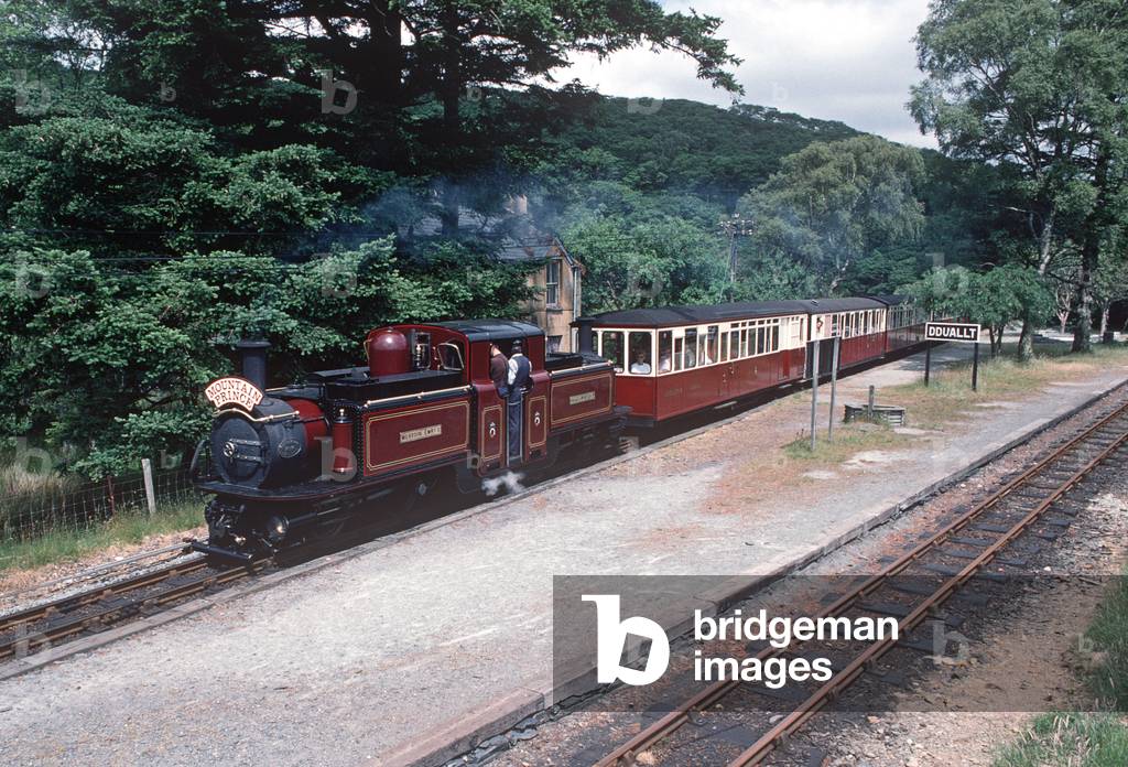 Steam locomotive Merddin Emrys at the Ddaullt Halt on the Ffestiniog Railway, Porthmadog to Blaenau Ffestiniog, Gwynedd, North Wales, 1990 (photo)