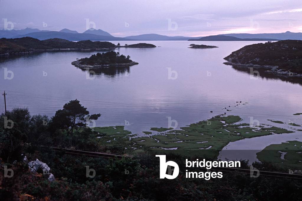 Kyle of Lochalsh Line running alongside Loch Carron, North West Coast of Scotland, 1982 (photograph)