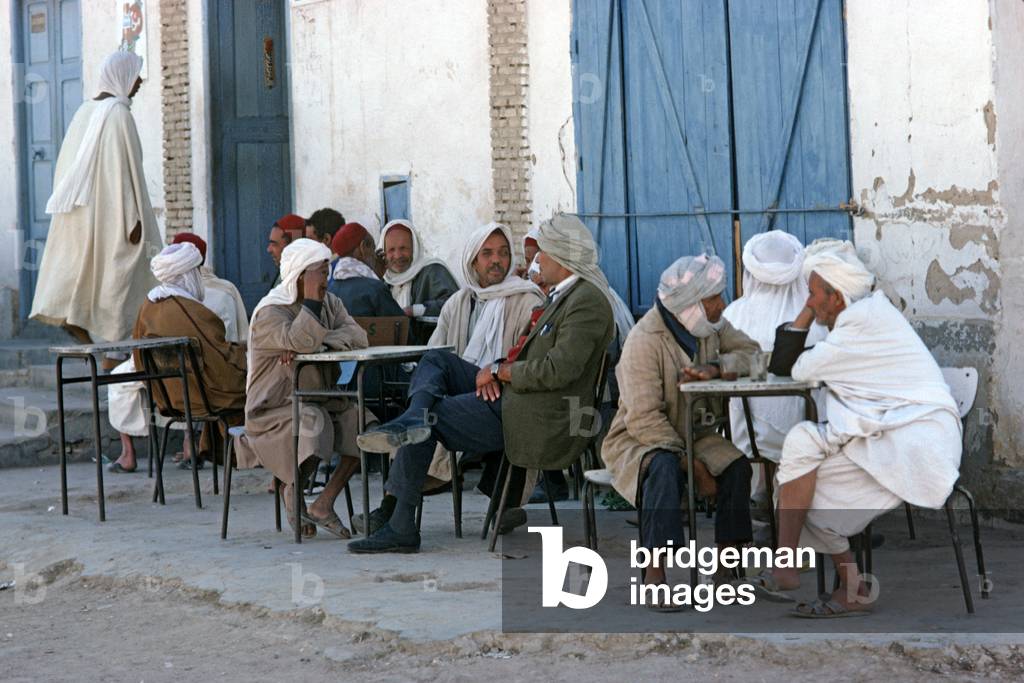 Arab Berger men sitting in cafe terrace, South Tunisia, North Africa (photo)