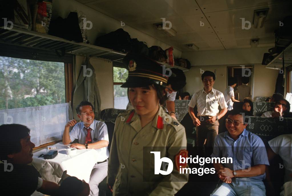 Railway police woman on Chinese train, China (photo)