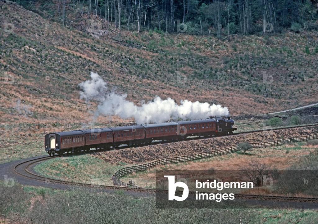North Yorkshire Moors Railway steam train in the Newtondale Gorge, North Yorkshire, England, UK, 1992 (photo)