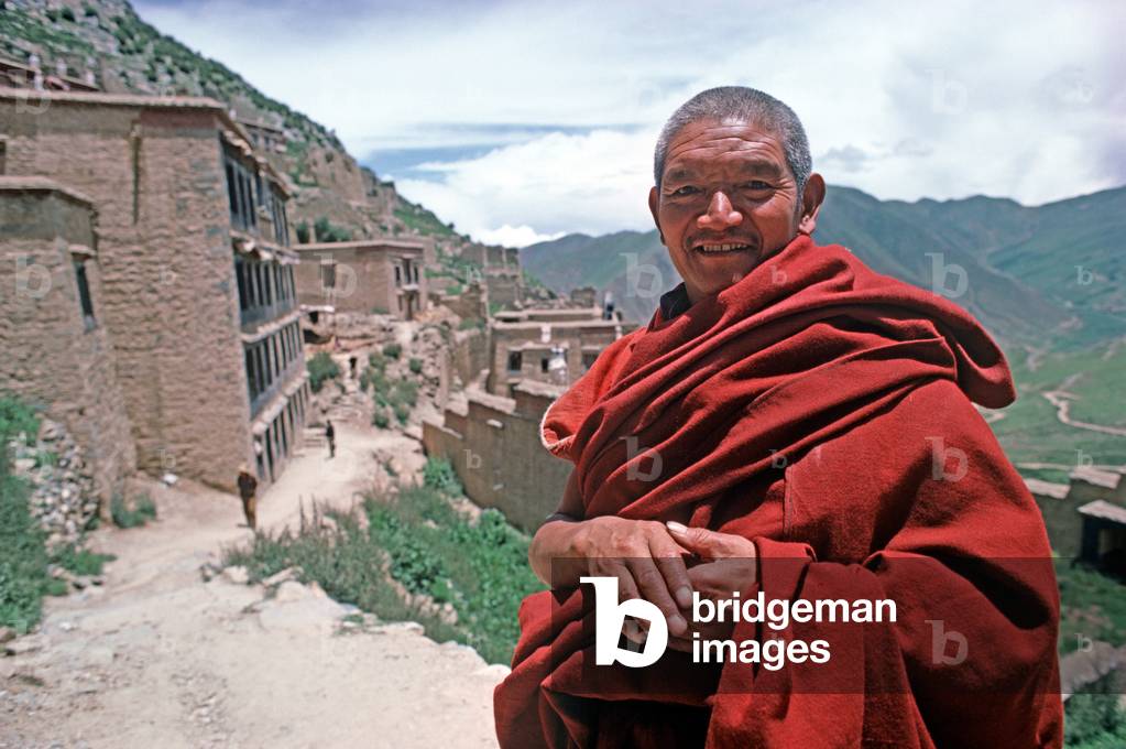 Buddhist monk in Ganden Monastery destroyed by the Red Guards in 1966, Tibet (photo)