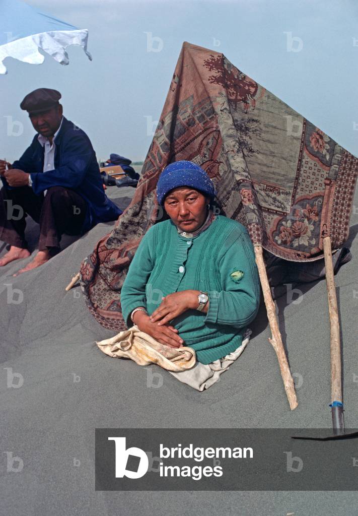 Turpan Hot Sands treatment for Arthritist and Lumbago , Turpan Desert, Xinjiang Province, China, 1985 (photo)