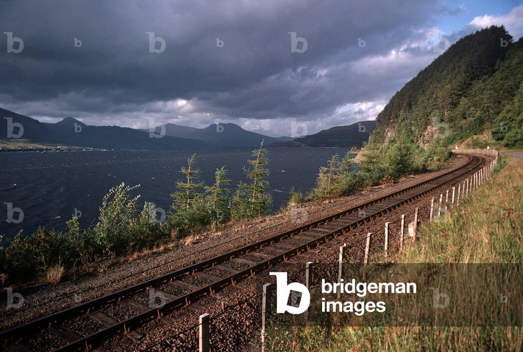 Kyle of Lochalsh Line running alongside Loch Carron, North West Coast of Scotland, 1982 (photograph)