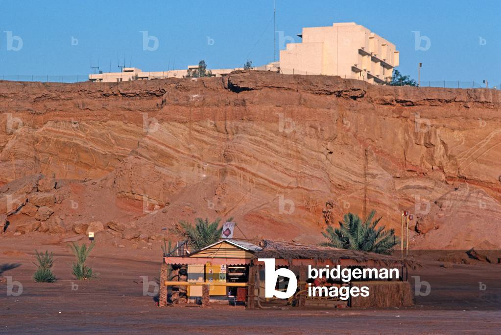 Cafe under cliffs with new Israeli settlement in Sharm El Sheik during Israel occupation of Sinai Peninsula, 1981 (photo)