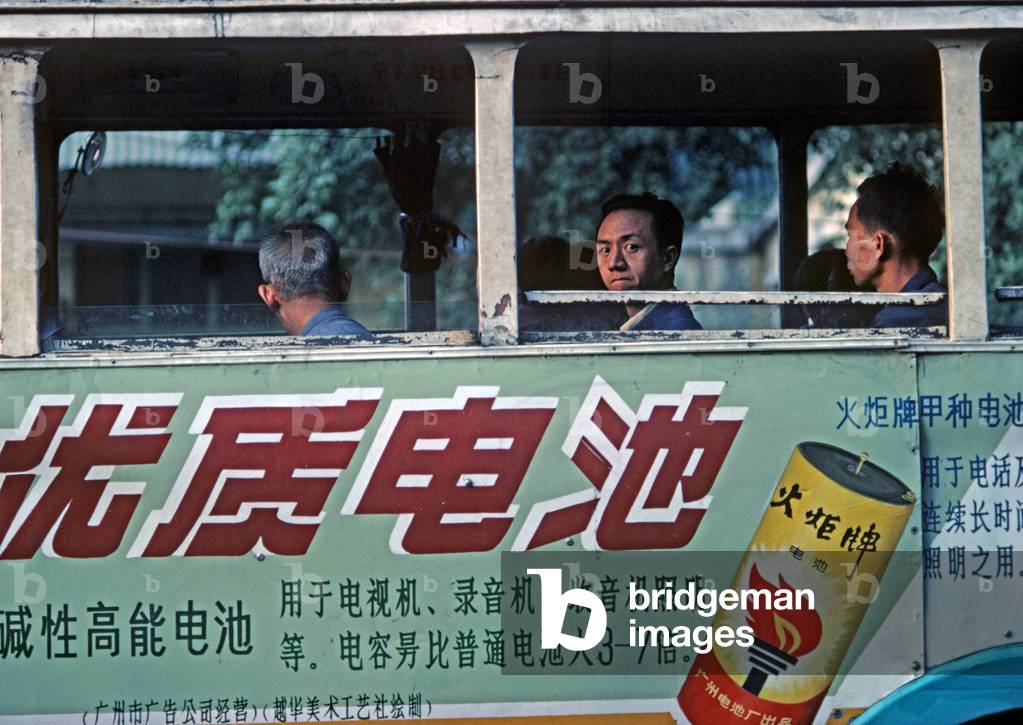 Passengers and Bus with painted advertising sign, Hangzhou, Zhejiang Province, China (photo)