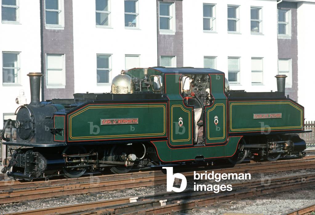 Steam locomotive at Porthmadog railway station, Gwynedd, North Wales, 1990 (photo)