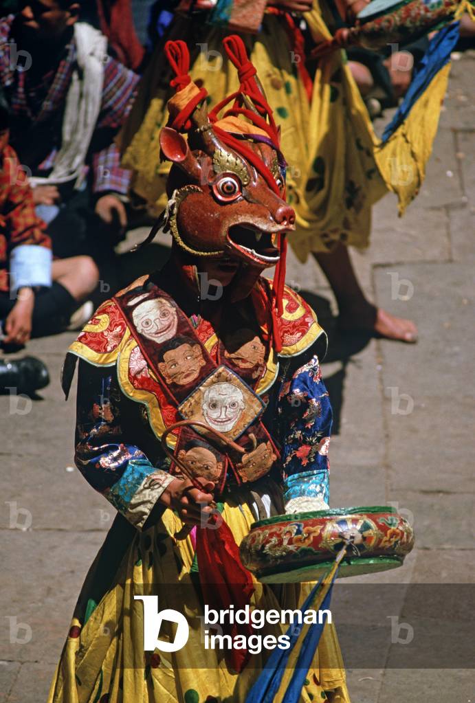 Animal mask dancer at the Paro Tshechu, mask dance festival, in the Paro Dzong, Bhutan (photo)