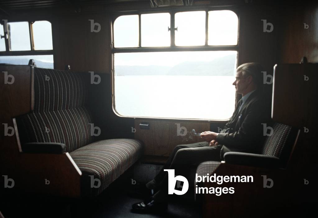 Passenger smoking on Kyle of Lochalsh Line British Rail train, Scotland, 1982 (photograph)