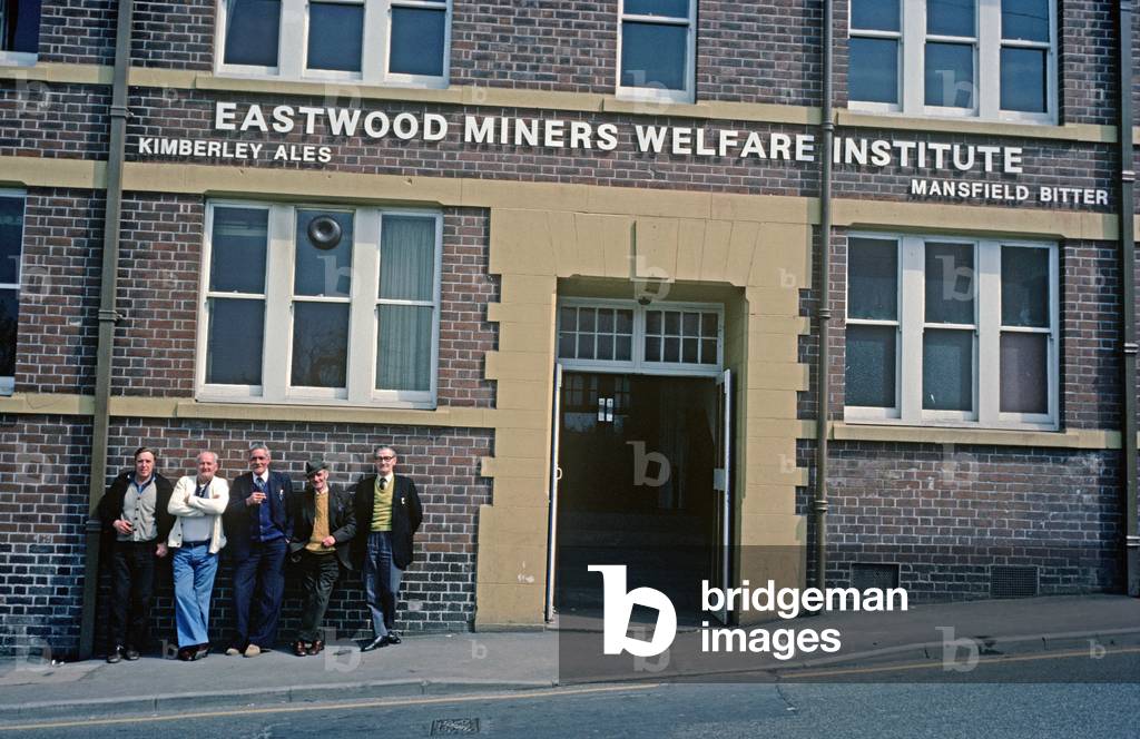 Coalminers outside Eastwood Miners Welfare Institute, Eastwood, South Nottinghamshire (photo)