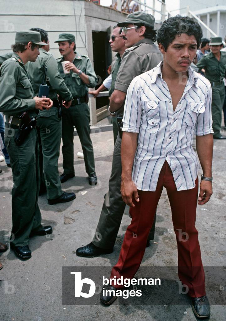 Daniel Ortega and fellow members of the Junta of National Reconstruction protected by Bodyguards at May Day rally in Managua, Nicaragua, Central America (photo)