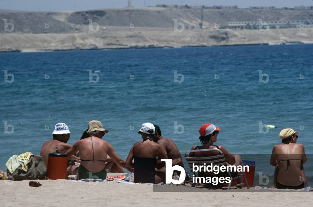 Sunbathers on Sharm El Sheik beach during Israel occupation of Sinai Peninsula, 1981 (photo)