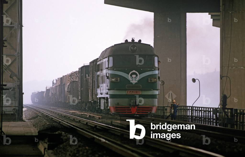 Diesel freight train entering Yangtze Railway Bridge, Nanjing, Jiangsu Province, China (photo)