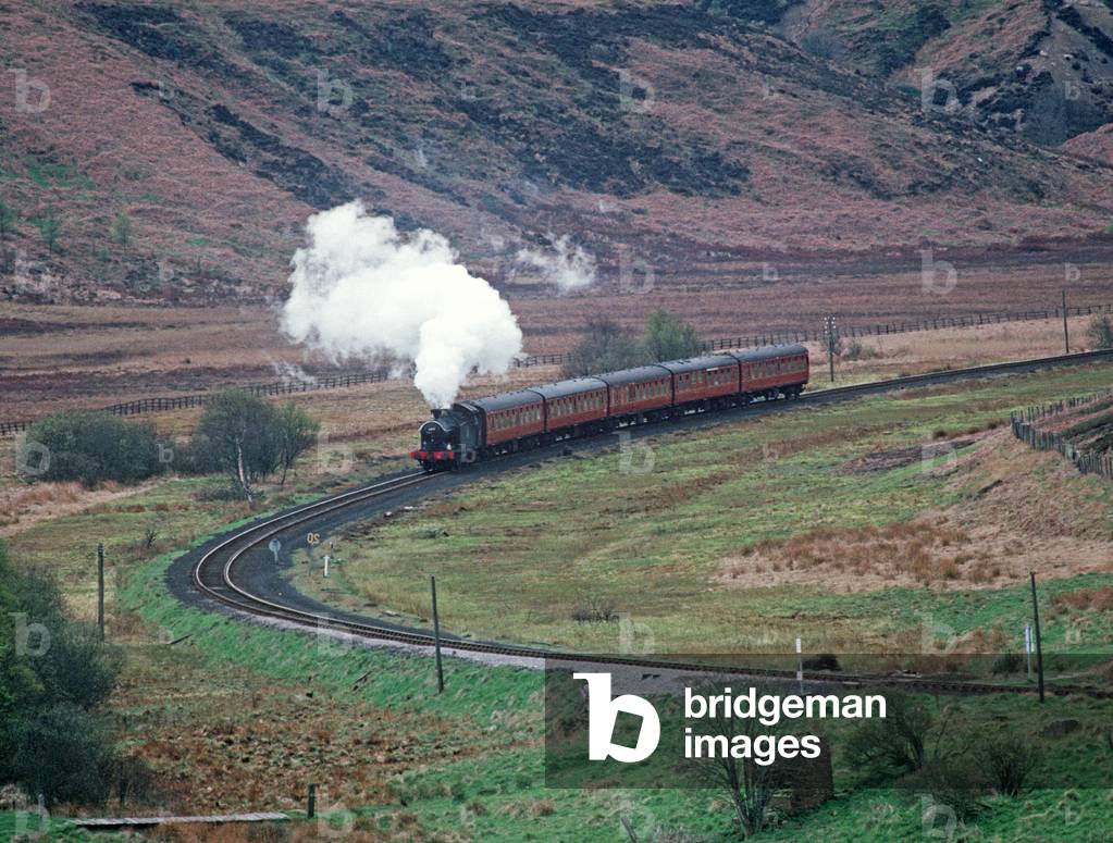North Yorkshire Moors Railway steam train in the Newtondale Gorge, North Yorkshire, England, UK, 1992 (photo)